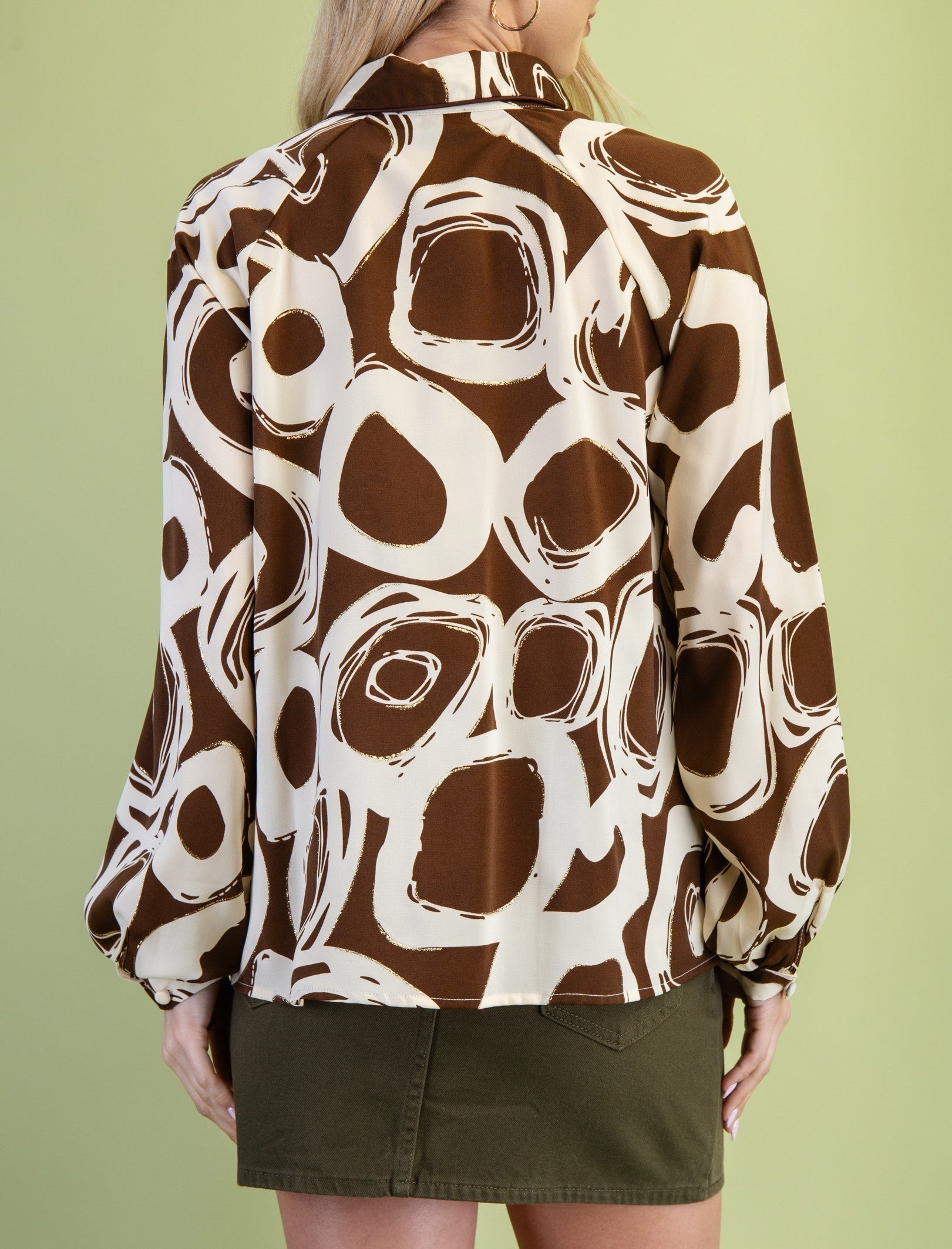 BROWN MIX PRINT GLITTER ACCENT LONG SLEEVE POPOVER TOP
