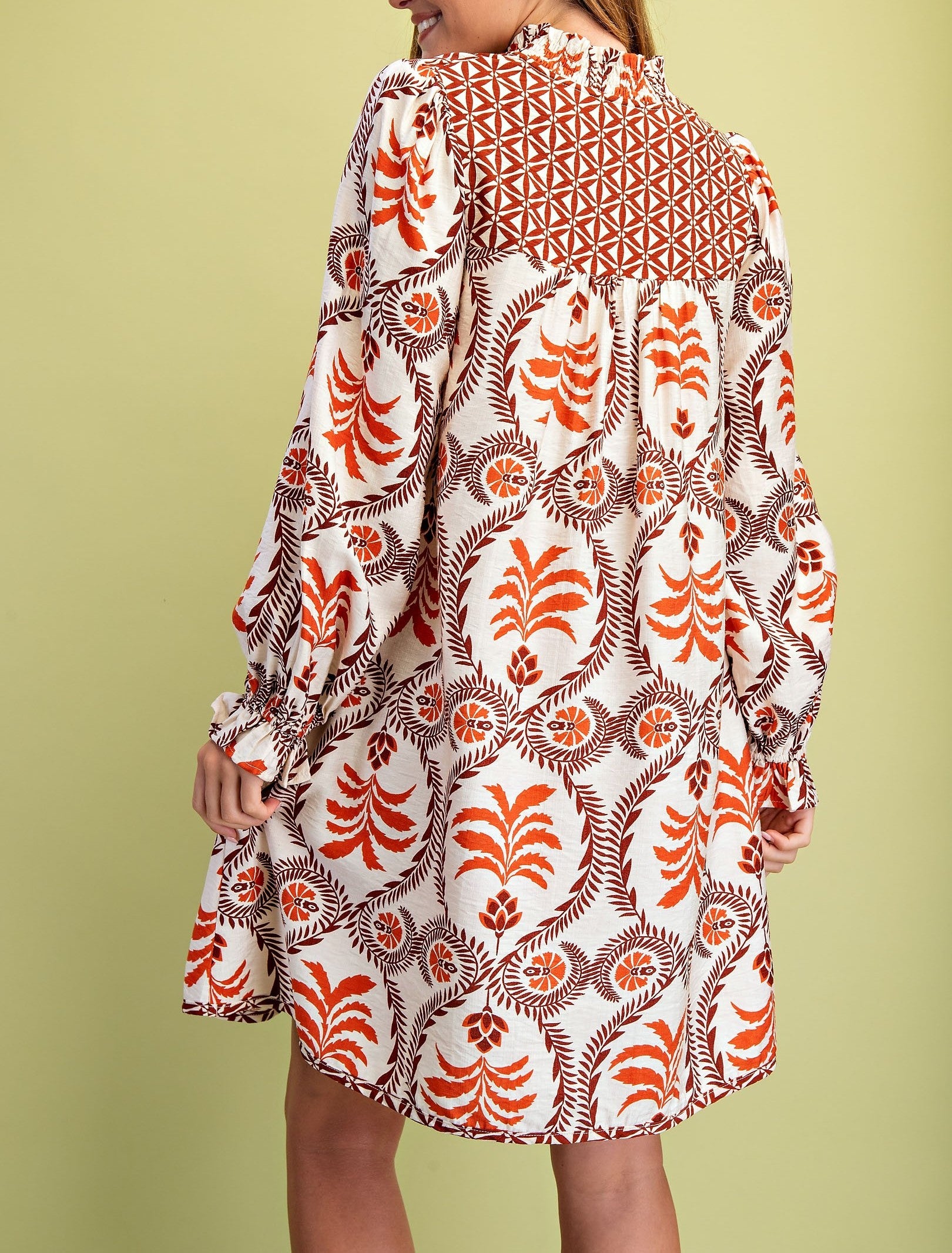 RUST MIX PRINTED VNECK WITH CONTRASTING YOKE LONG SLEEVE MINI DRESS
