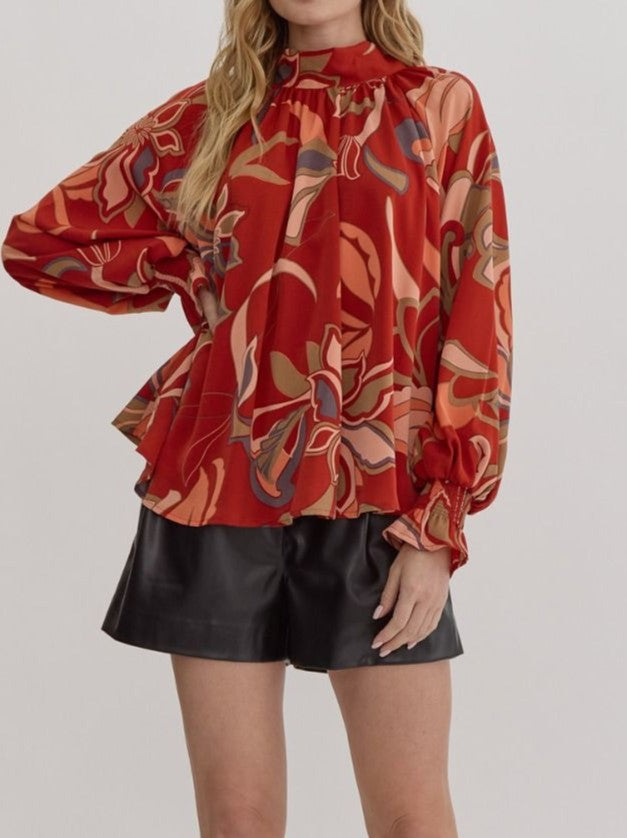 RUST PRINTED MOCK/TIE NECK FLOWY SLEEVE BLOUSE