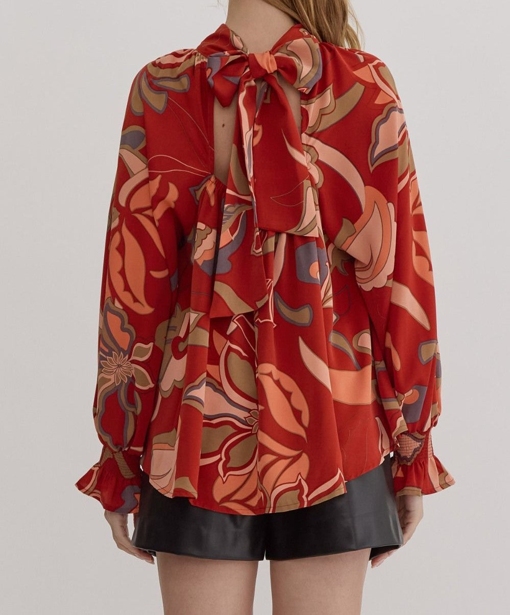 RUST PRINTED MOCK/TIE NECK FLOWY SLEEVE BLOUSE