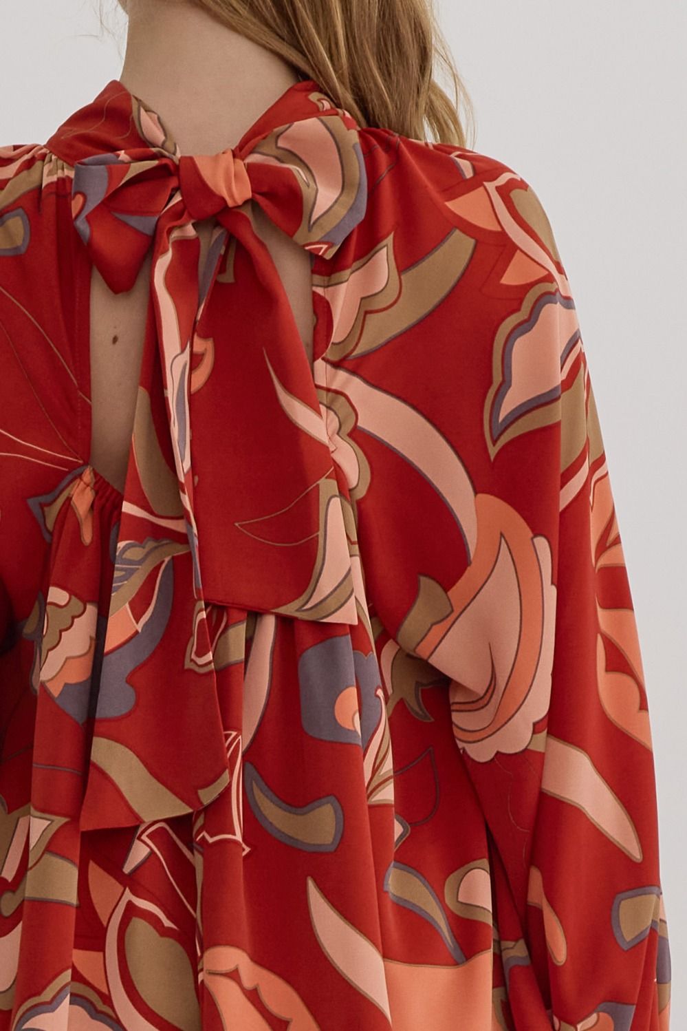 RUST PRINTED MOCK/TIE NECK FLOWY SLEEVE BLOUSE