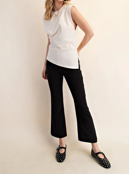 IVORY ASYMMERTRICAL HEM PLEATED TOP