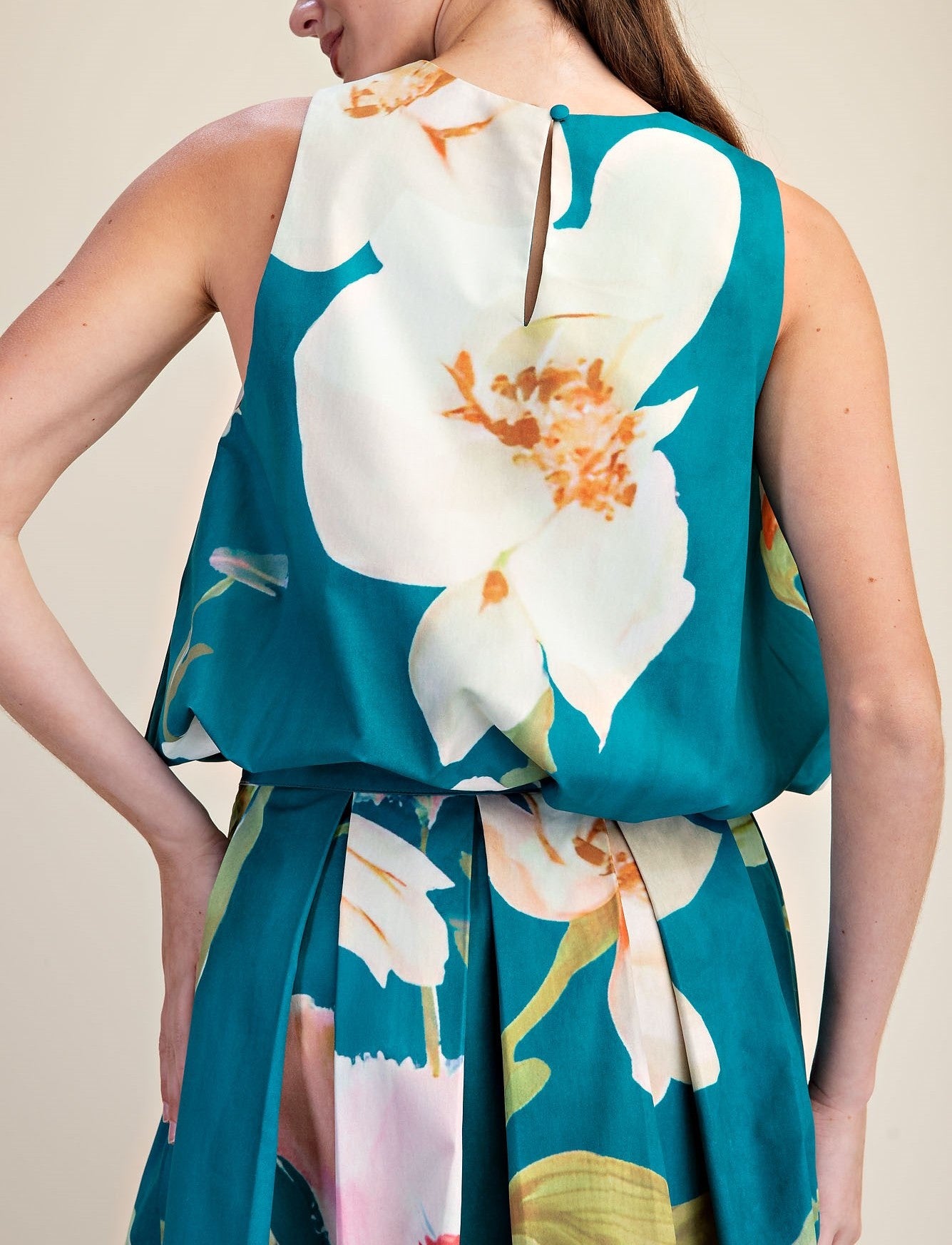TURQUOISE FLORAL PRINT SLEEVELESS BUBBLE HEM TOP