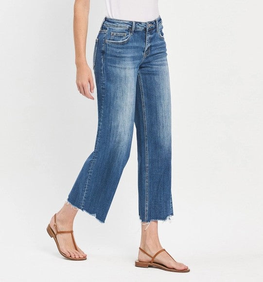 MEDIUM WASH MESMERIZES MID RISE RAW HEM WIDE LEG JEANS