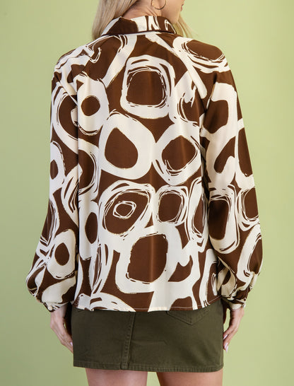 BROWN MIX PRINT GLITTER ACCENT LONG SLEEVE POPOVER TOP