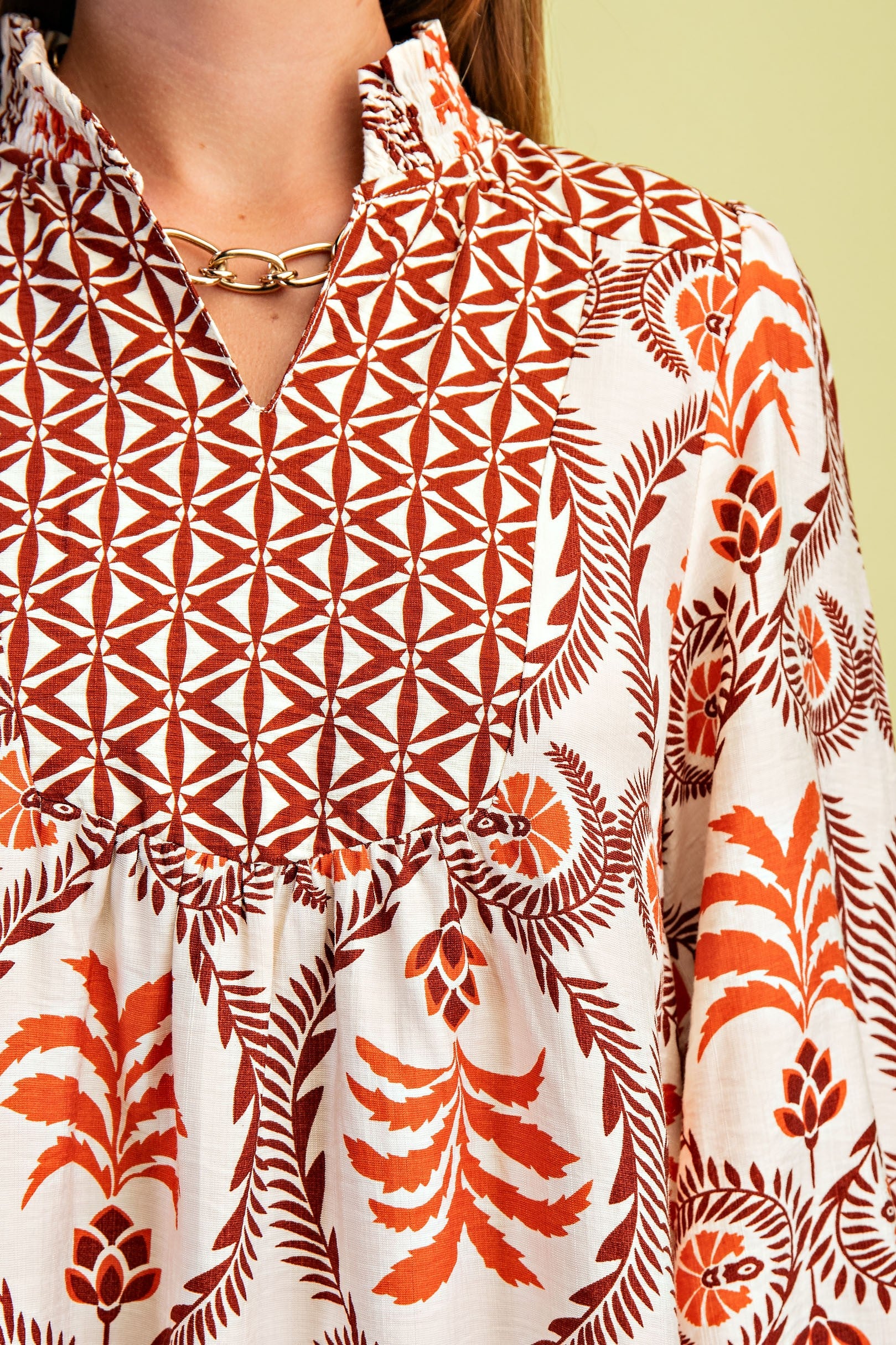 RUST MIX PRINTED VNECK WITH CONTRASTING YOKE LONG SLEEVE MINI DRESS