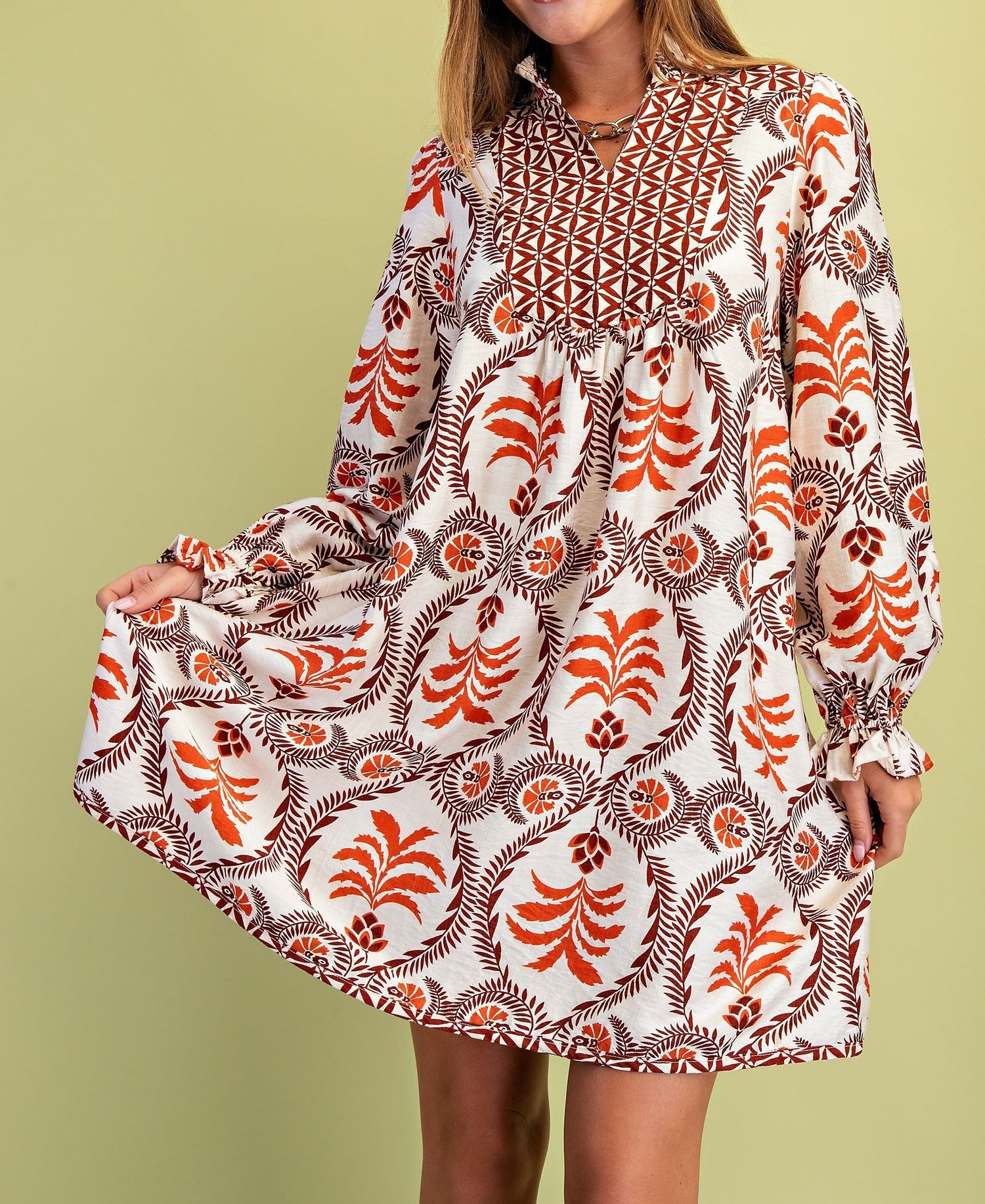 RUST MIX PRINTED VNECK WITH CONTRASTING YOKE LONG SLEEVE MINI DRESS