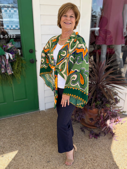 GREEN MULTI PRINTED V NECK FRONT TIE TOP