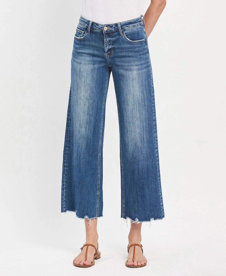 MEDIUM WASH MESMERIZES MID RISE RAW HEM WIDE LEG JEANS