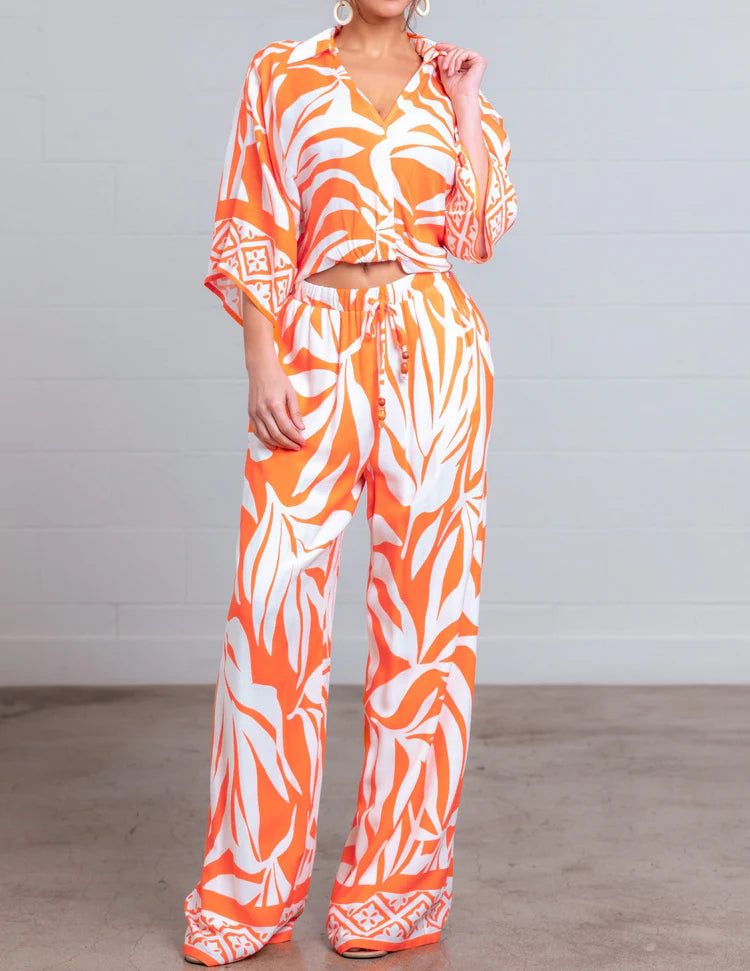 ORANGE MULTI LEAF PRINT WIDE LEG PANTS