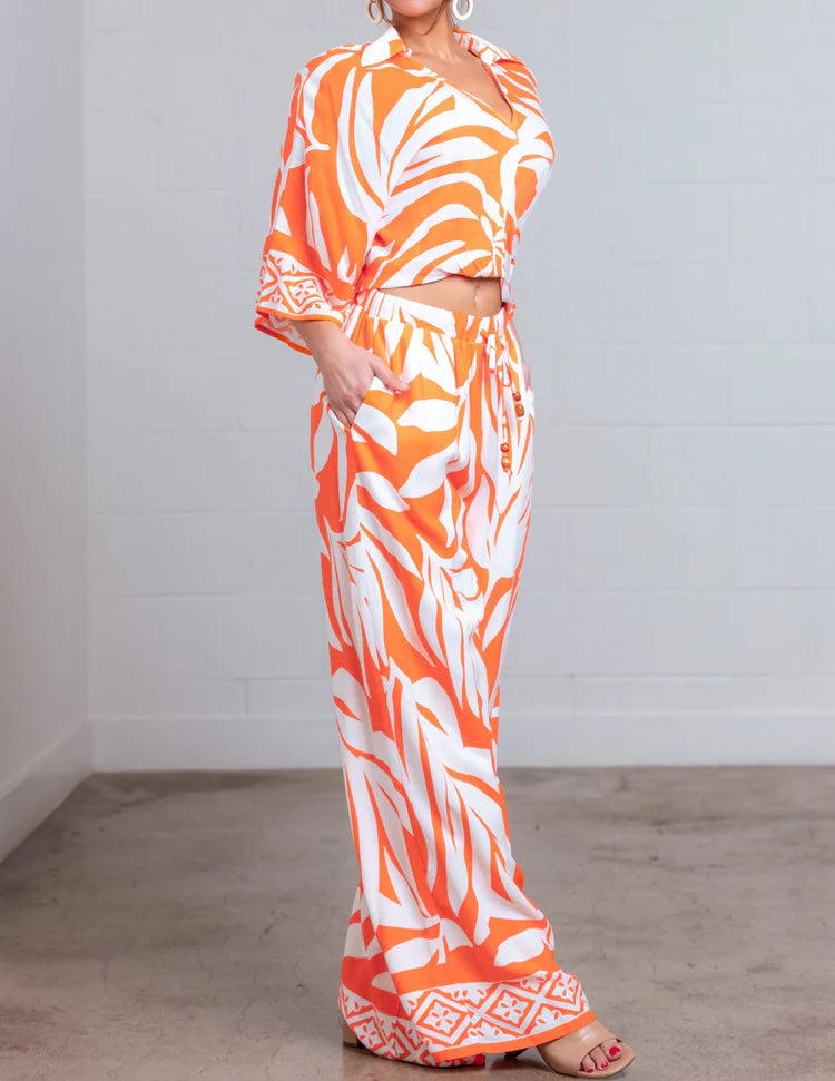 ORANGE MULTI LEAF PRINT WIDE LEG PANTS