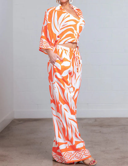 ORANGE MULTI LEAF PRINT WIDE LEG PANTS