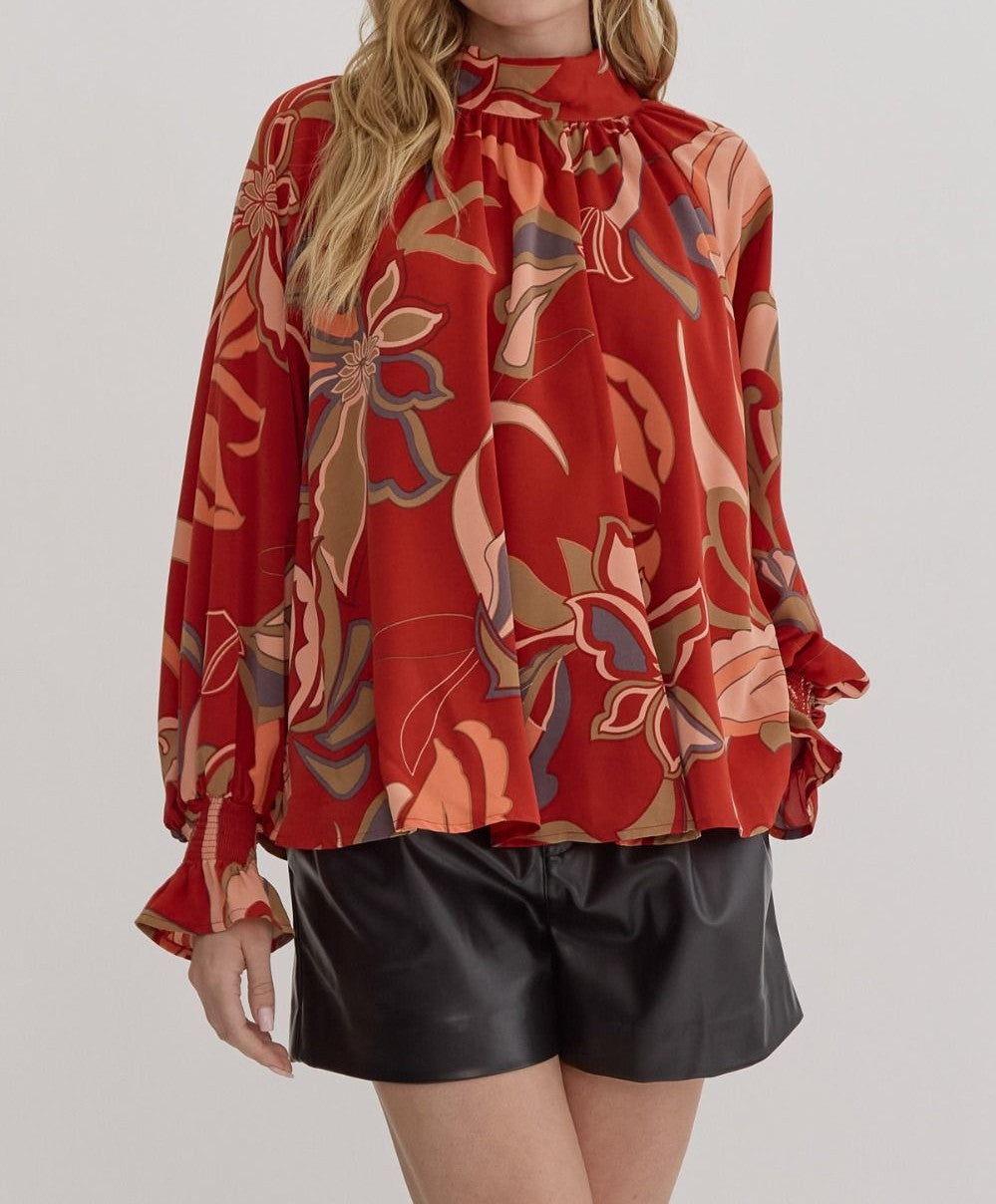 RUST PRINTED MOCK/TIE NECK FLOWY SLEEVE BLOUSE