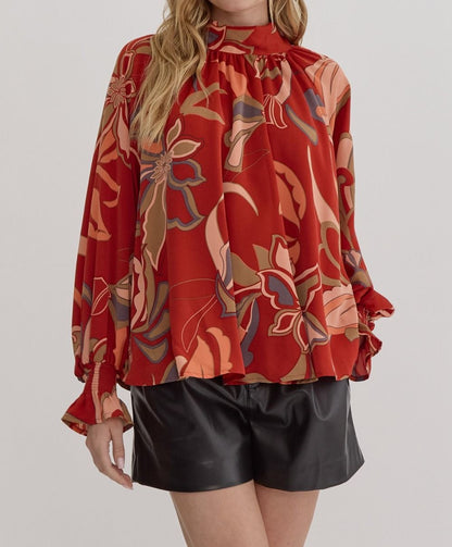 RUST PRINTED MOCK/TIE NECK FLOWY SLEEVE BLOUSE