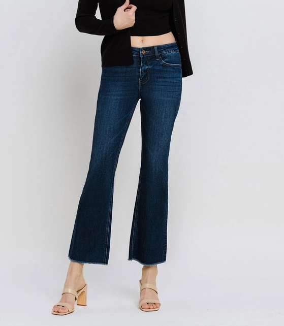 PRIVILEGE DARK WASH MID RISE RAW HEM KICK FLARE JEANS
