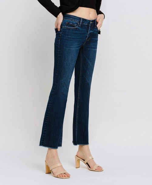 PRIVILEGE DARK WASH MID RISE RAW HEM KICK FLARE JEANS